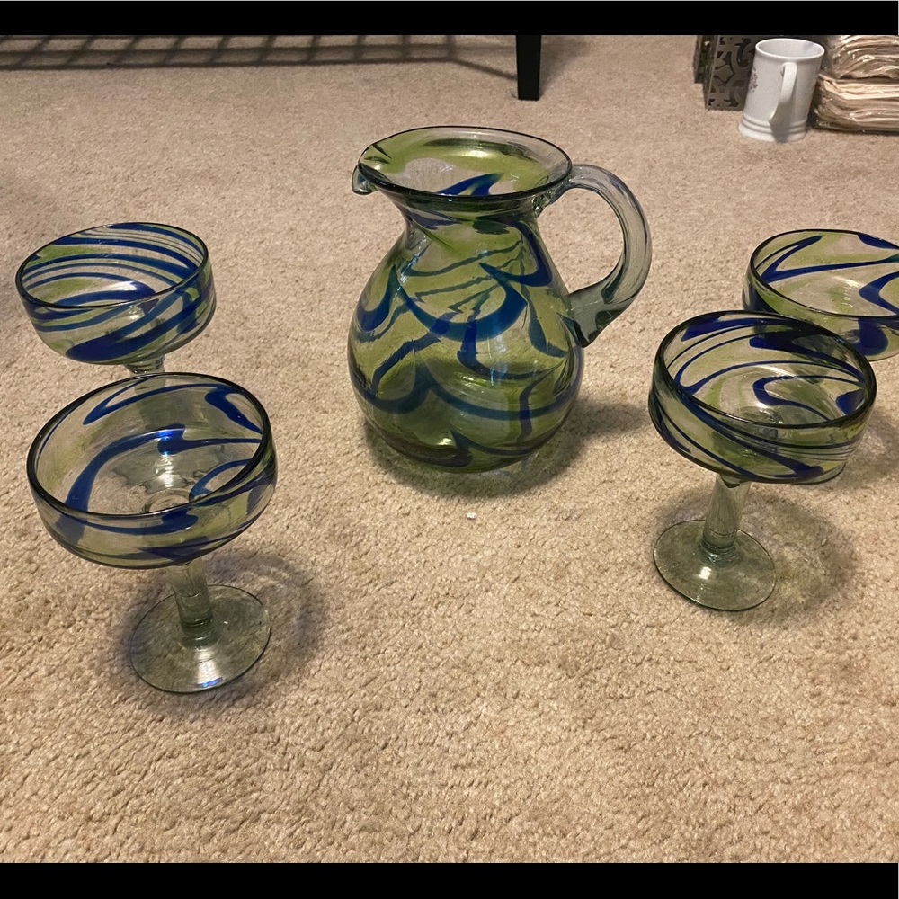 Hand blown margarita pitcher and 4 glasses. Like new condition.